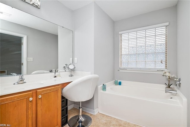 full bath with visible vents, a wealth of natural light, a garden tub, and vanity