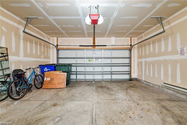 garage featuring a garage door opener