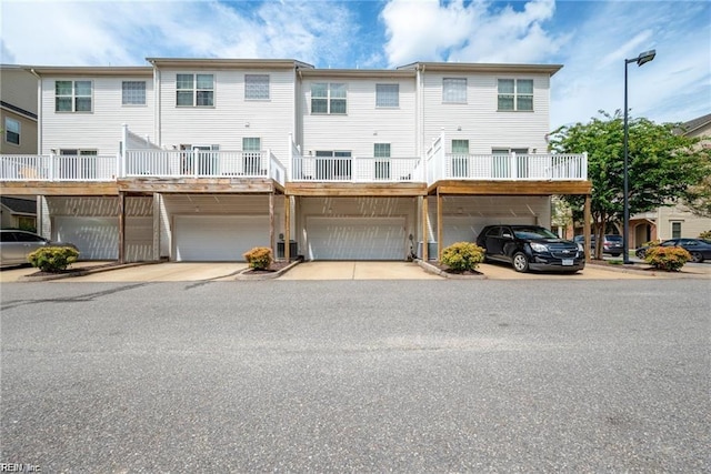 view of front of house with an attached garage and driveway