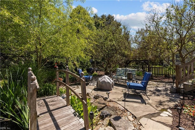 view of patio / terrace with fence and outdoor lounge area