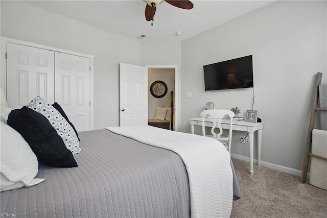 bedroom featuring carpet floors, visible vents, a closet, baseboards, and ceiling fan