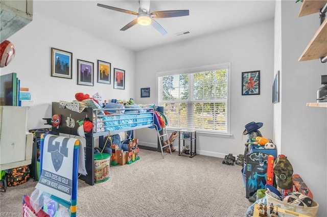 bedroom featuring visible vents, baseboards, carpet floors, and ceiling fan