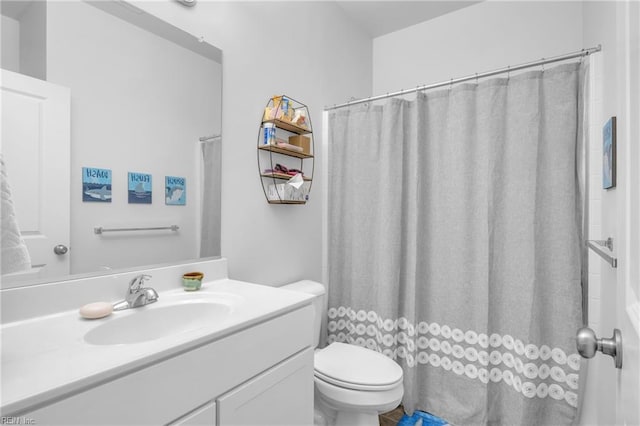 full bath with toilet and vanity