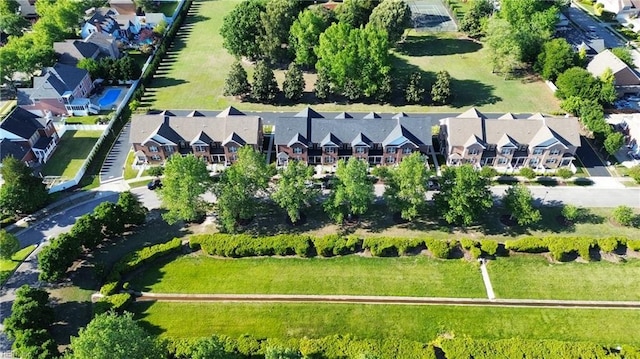 birds eye view of property with a residential view