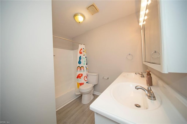 bathroom featuring a sink, toilet, double vanity, and shower / tub combo with curtain