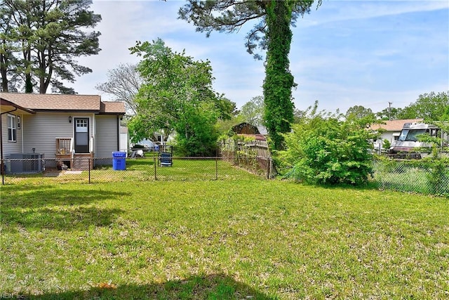 view of yard featuring a fenced backyard and cooling unit