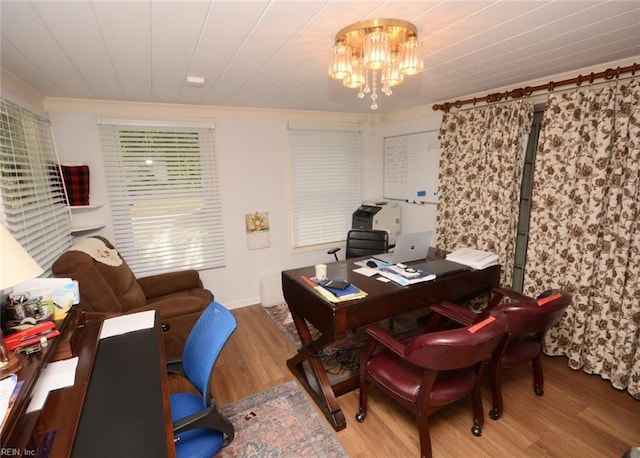 office with a notable chandelier and wood finished floors