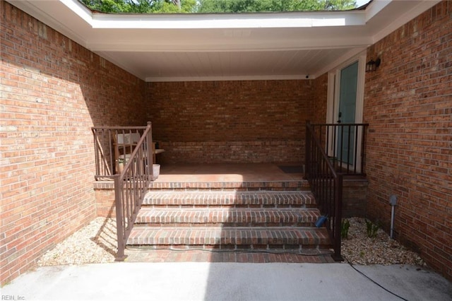 exterior space with brick siding