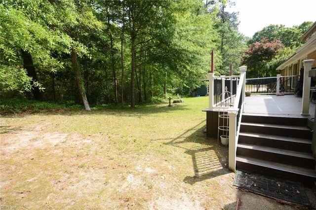 view of yard featuring a deck