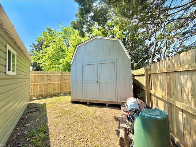 view of shed featuring a fenced backyard