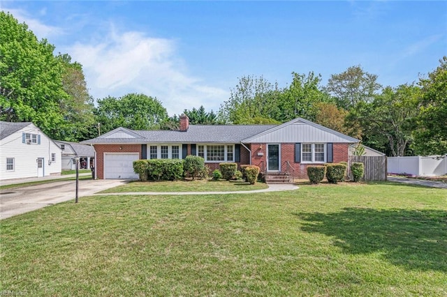 100 Hudgins Rd, Poquoson, VA 23662 - single story home with a garage, fence, a chimney, brick siding, and driveway