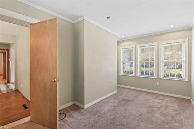 100 Hudgins Rd, Poquoson, VA 23662 - spare room featuring baseboards and ornamental molding