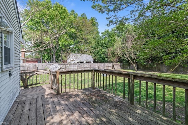 100 Hudgins Rd, Poquoson, VA 23662 - wooden deck with a fenced backyard and a lawn
