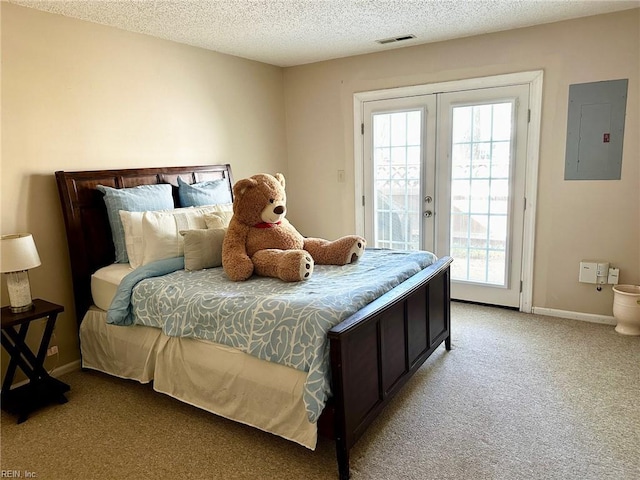 bedroom featuring electric panel, visible vents, access to exterior, baseboards, and light carpet