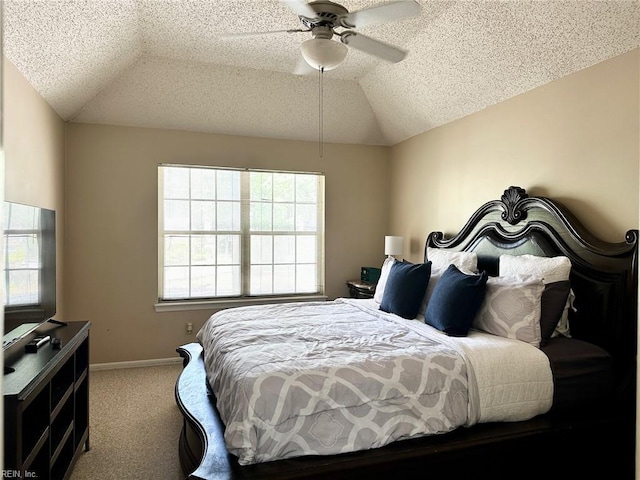 carpeted bedroom featuring baseboards, a textured ceiling, ceiling fan, and lofted ceiling