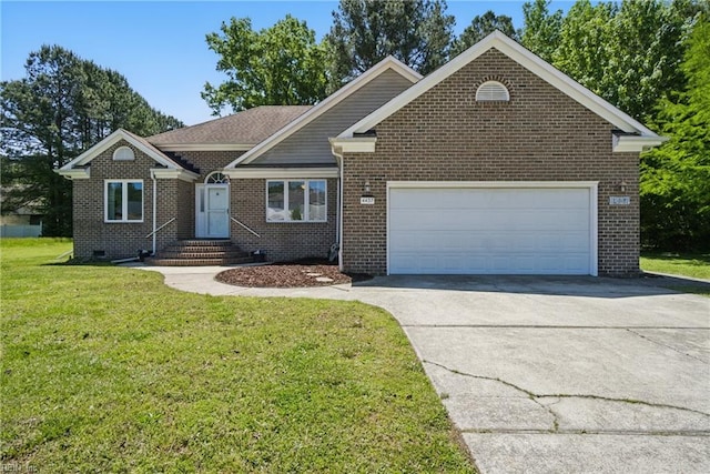 view of front facade featuring a garage, a front yard, driveway, and brick siding