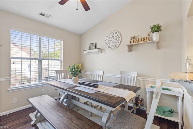 dining room with visible vents, baseboards, wood finished floors, and a wealth of natural light