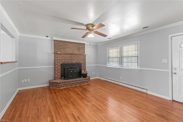 unfurnished living room with a baseboard radiator, a ceiling fan, wood finished floors, and ornamental molding