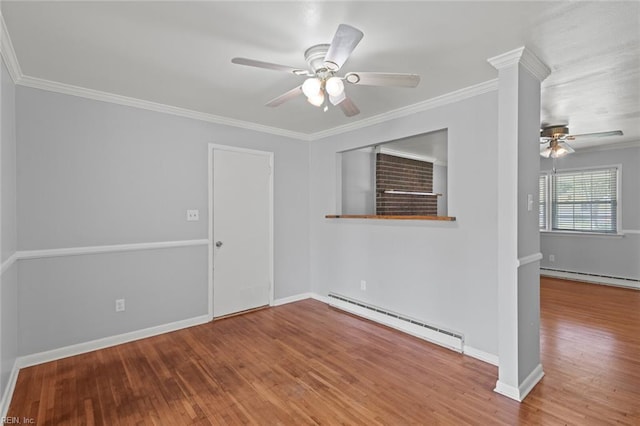 empty room with crown molding, baseboard heating, a ceiling fan, wood finished floors, and a baseboard heating unit