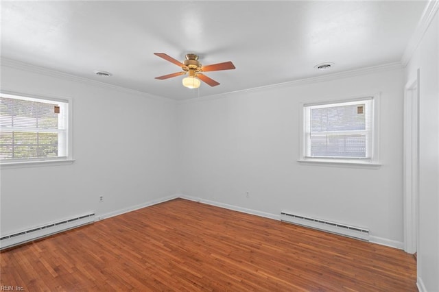 unfurnished room featuring baseboards, a baseboard radiator, ceiling fan, and wood finished floors