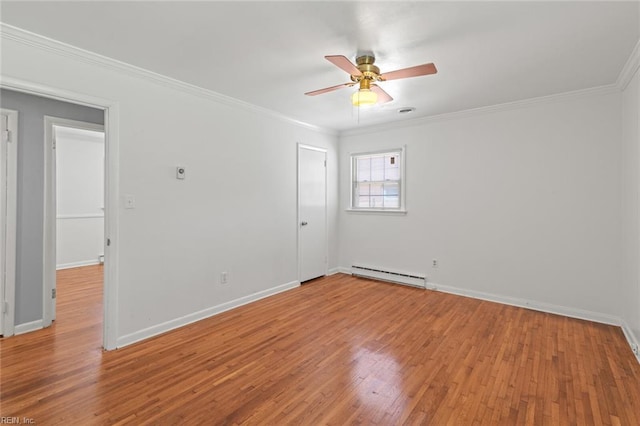 unfurnished room with a baseboard radiator, ornamental molding, ceiling fan, and wood finished floors