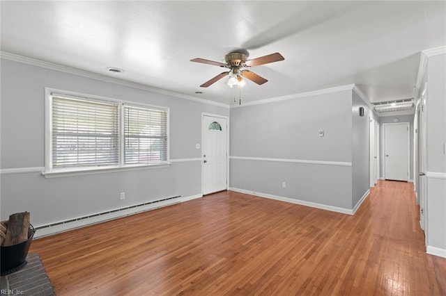 unfurnished living room with a ceiling fan, visible vents, hardwood / wood-style flooring, a baseboard radiator, and ornamental molding
