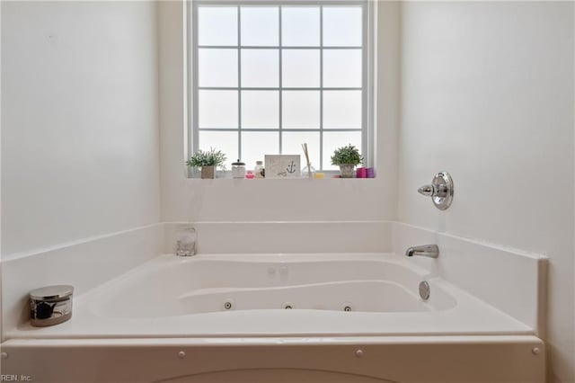 bathroom featuring a whirlpool tub