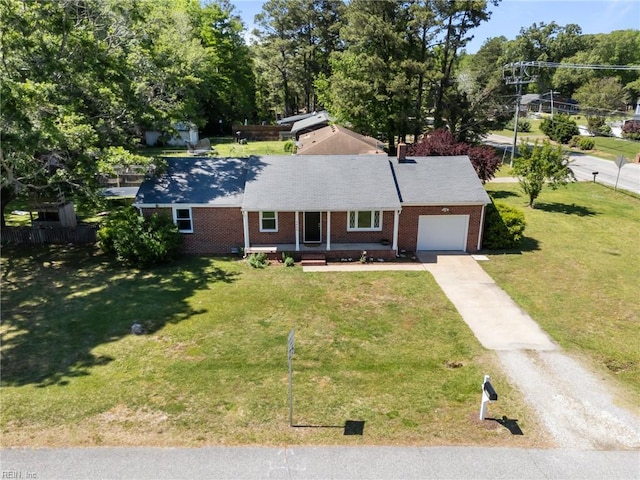 2600 Smithson Dr, Chesapeake, VA 23322 - ranch-style house featuring a porch, a garage, driveway, and brick siding