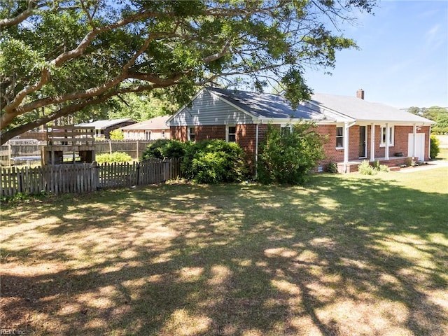 view of yard featuring fence