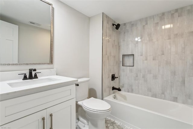 full bathroom with vanity, tile patterned flooring, visible vents, toilet, and shower / bathing tub combination