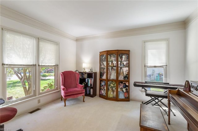 living area featuring visible vents, crown molding, and carpet floors