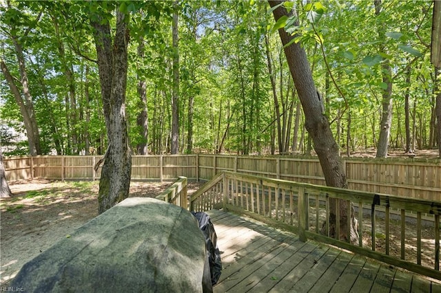 deck featuring a fenced backyard