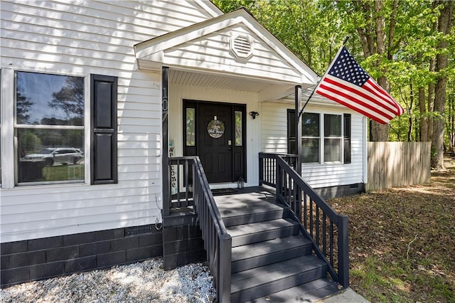 entrance to property featuring crawl space