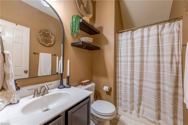 full bath with vanity and toilet