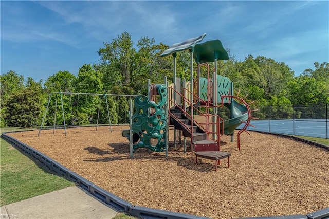 community jungle gym with fence