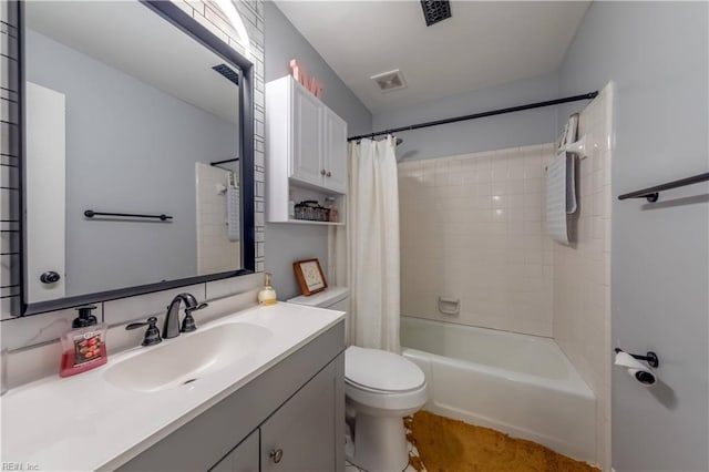 full bath with vanity, shower / tub combo, toilet, and visible vents