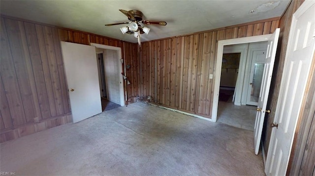 1233 Transylvania Ave, Chesapeake, VA 23324 - carpeted spare room with ceiling fan and wood walls