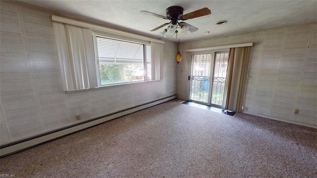1233 Transylvania Ave, Chesapeake, VA 23324 - empty room featuring baseboard heating, carpet flooring, a ceiling fan, and wallpapered walls