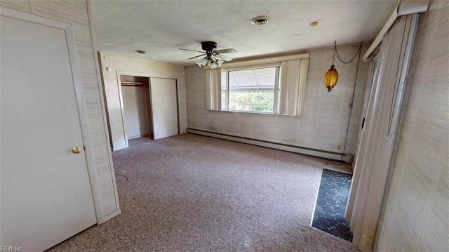 1233 Transylvania Ave, Chesapeake, VA 23324 - unfurnished bedroom with baseboard heating, carpet floors, a closet, and ceiling fan