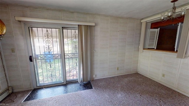 1233 Transylvania Ave, Chesapeake, VA 23324 - carpeted spare room with a baseboard heating unit