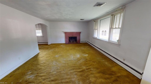 1233 Transylvania Ave, Chesapeake, VA 23324 - unfurnished living room with a baseboard radiator, a baseboard heating unit, arched walkways, a fireplace, and baseboards