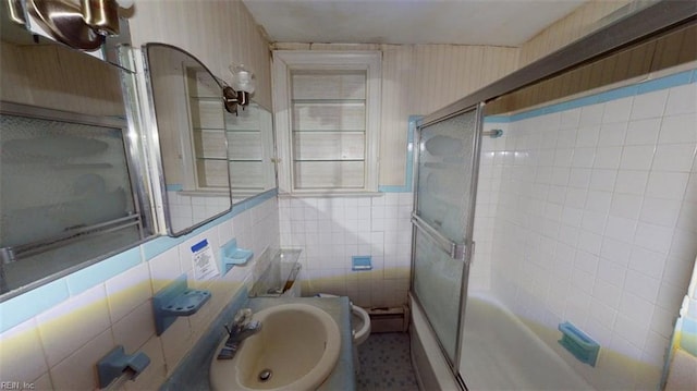 1233 Transylvania Ave, Chesapeake, VA 23324 - full bath featuring a sink, a shower with door, toilet, and tile walls