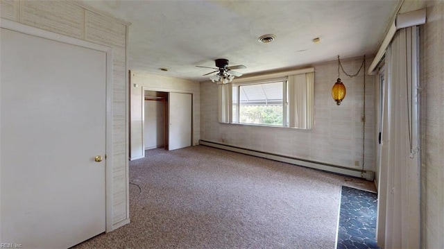 1233 Transylvania Ave, Chesapeake, VA 23324 - unfurnished bedroom with a baseboard heating unit, carpet floors, a closet, and a ceiling fan