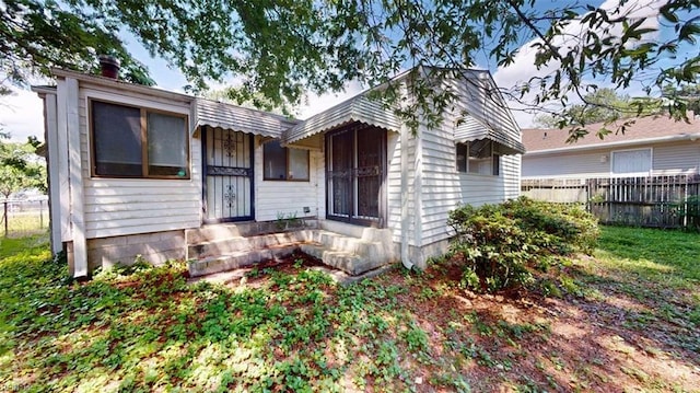 1233 Transylvania Ave, Chesapeake, VA 23324 - bungalow-style home featuring fence and a chimney