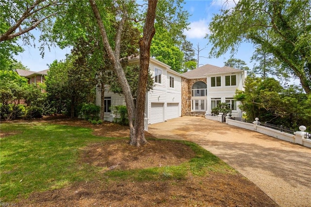 view of front facade with an attached garage and driveway