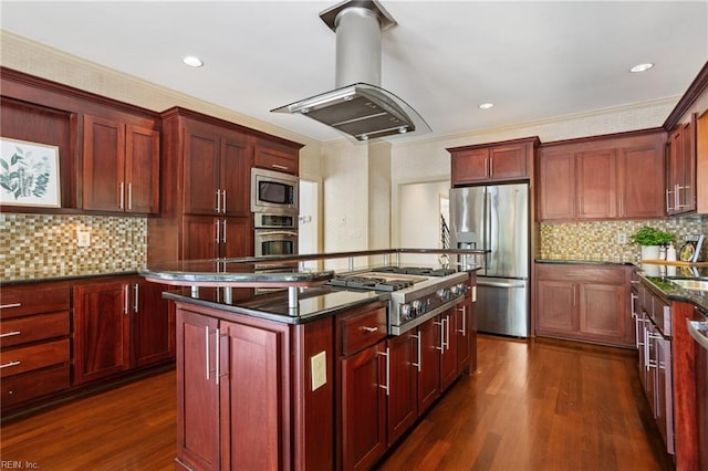 kitchen with island range hood, appliances with stainless steel finishes, a center island, dark brown cabinets, and dark wood-style floors