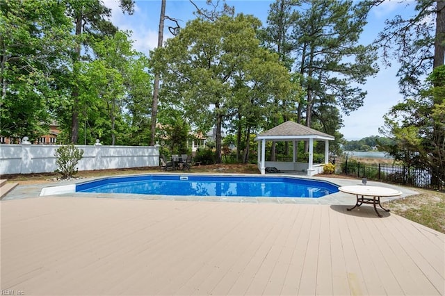 view of swimming pool with a fenced in pool, a gazebo, and a fenced backyard