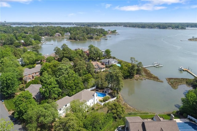 drone / aerial view with a water view and a residential view