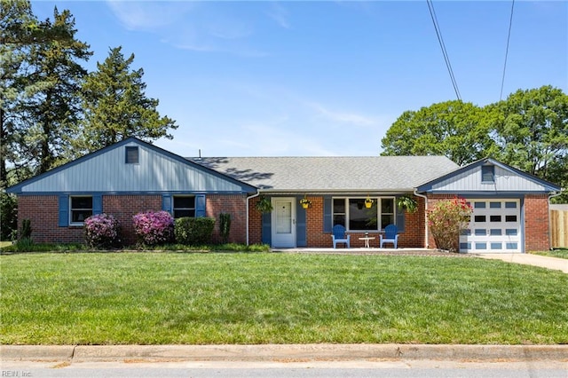 single story home with a porch, brick siding, a front lawn, concrete driveway, and an attached garage
