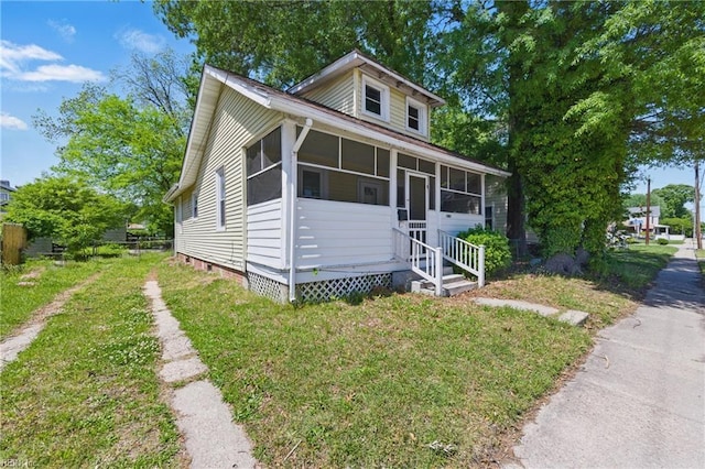 bungalow featuring a sunroom and crawl space